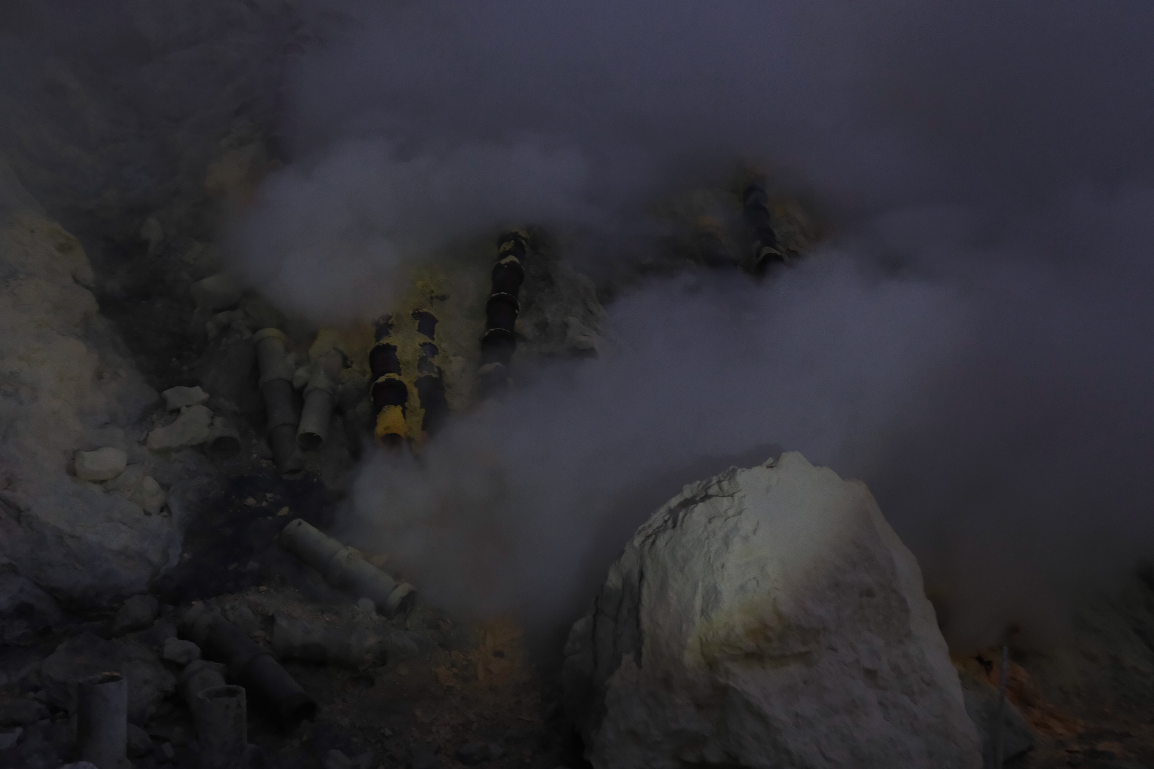Inside Kawah Ijen sulfur crater before dawn